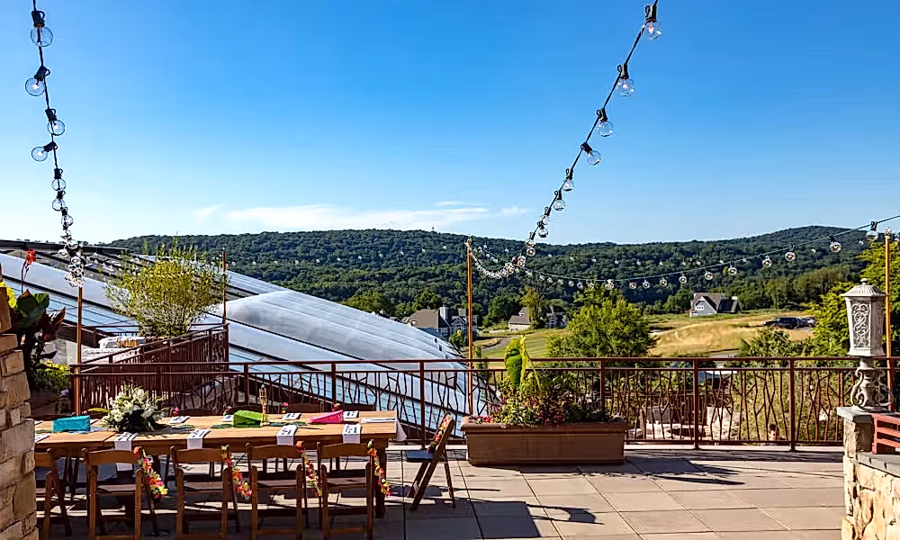 An event set up on the terrace overlooking a view from Crystal Springs Resort