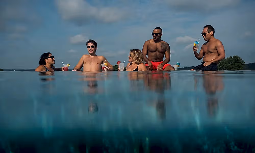 Group of friends in vista 180 pool.