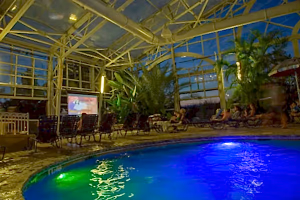 Movie screen in tropical Biosphere pool complex.